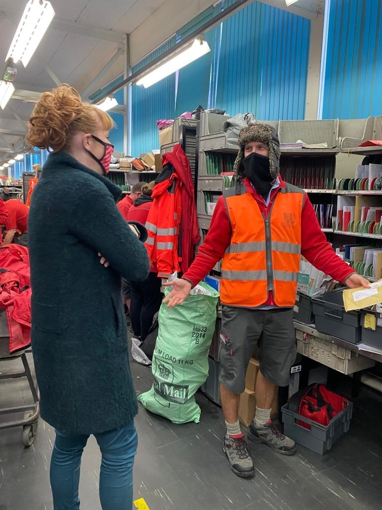 Angela Rayner speaking with a staff member at the Ashton delivery office