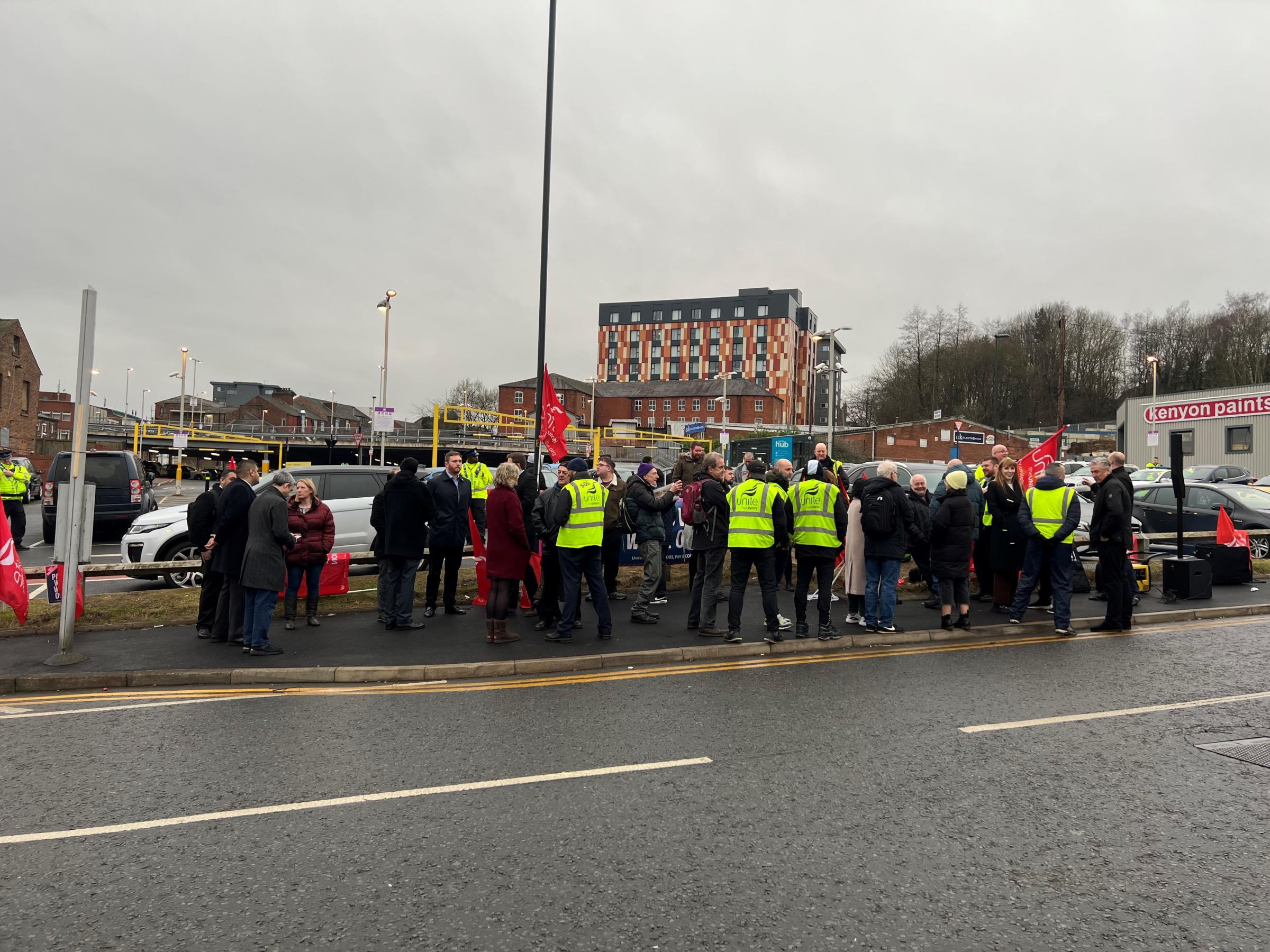 They were stood outside the First Manchester depot on Wallshaw Street, Oldham