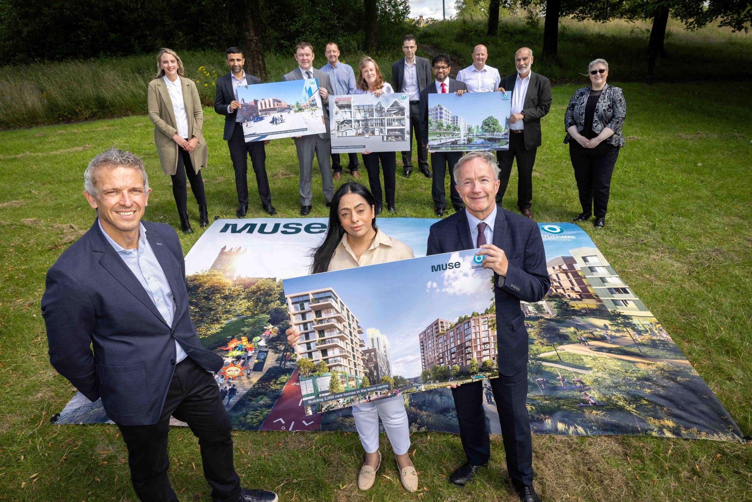 Phil Mayall from Muse, council leader, Cllr Arooj Shah, and the council cabinet and officers, as well as the Muse bid team (Picture: Oldham Council)